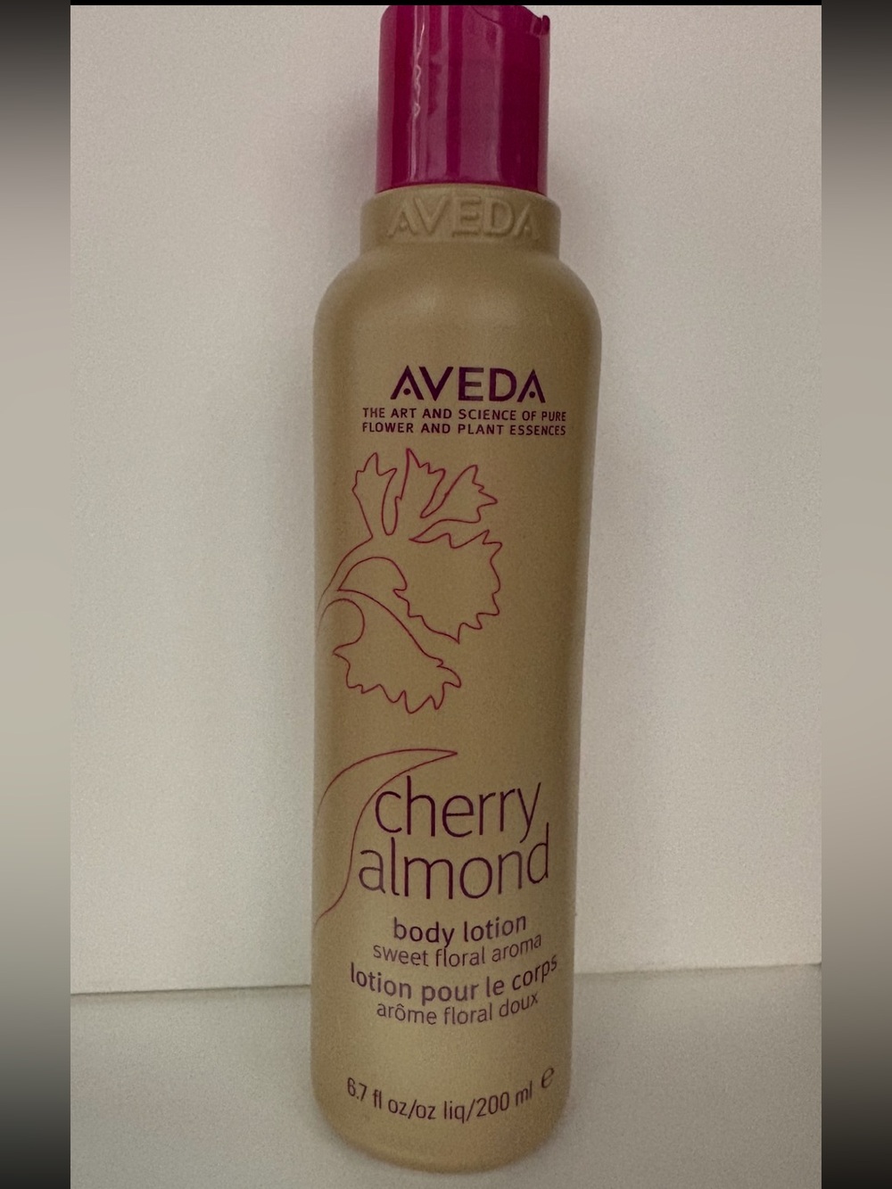 AVEDA Cherry Almond Body Lotion — Beige with Pink Cap